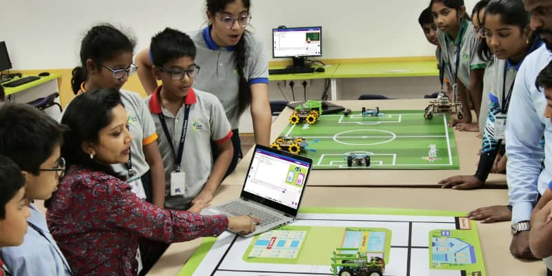 A Robotics Teacher from ICSE school teaching Robotics to Students