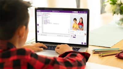 Kid engaged in Python programming on PictoBlox