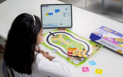 Kid doing an AI line-following activity using Wizbot, learning robotics basics through hands-on coding and sensor-based navigation