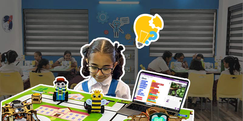 Students using an AI and robotics lab to break down problems through design, testing, debugging and iteration