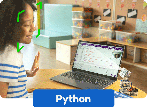 Girl programming Intellio desk companion using Python